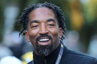 Former NBA Player, J.R. Smith smiles during a practice round prior to the 2025 Masters Tournament at Augusta National Golf Club on April 08, 2025 in Augusta, Georgia.