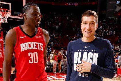 HOUSTON, TX - FEBRUARY 11: Clint Capela #30 of the Houston Rockets and Bogdan Bogdanovic #7 of the Los Angeles Clippers smile after the game on February 11, 2026 at the Toyota Center in Houston, Texas. (Photo by Logan Riely/NBAE via Getty Images)