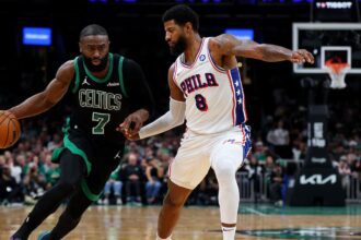 BOSTON, MASSACHUSETTS - APRIL 28: Paul George #8 of the Philadelphia 76ers defends Jaylen Brown #7 of the Boston Celtics during the second half of Game Five of the First Round of the NBA Eastern Conference Playoff at TD Garden on April 28, 2026 in Boston, Massachusetts. (Photo by Maddie Meyer/Getty Images)