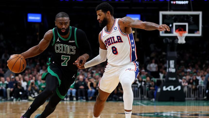 BOSTON, MASSACHUSETTS - APRIL 28: Paul George #8 of the Philadelphia 76ers defends Jaylen Brown #7 of the Boston Celtics during the second half of Game Five of the First Round of the NBA Eastern Conference Playoff at TD Garden on April 28, 2026 in Boston, Massachusetts. (Photo by Maddie Meyer/Getty Images)