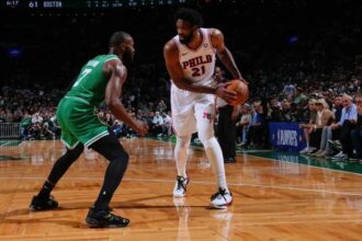 BOSTON, MA - MAY 2: Joel Embiid #21 of the Philadelphia 76ers is guarded by Jaylen Brown #7 of the Boston Celtics during the game during Round One Game Seven of the 2026 NBA Playoffs on May 2, 2026 at TD Garden in Boston, Massachusetts. (Photo by Brian Babineau/NBAE via Getty Images)