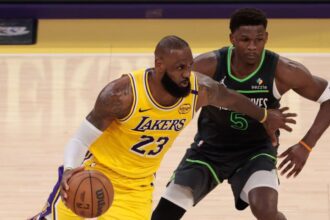 LOS ANGELES, CA - APRIL 30: Los Angeles Lakers forward LeBron James (23) looks to get past Minnesota Timberwolves guard Anthony Edwards (5) during game 5 of the first round of the NBA Western Conference Playoffs between the Minnesota Timberwolves and the Los Angeles Lakers on April 30, 2025, at Crypto.com Arena in Los Angeles, CA. (Photo by Jevone Moore/Icon Sportswire via Getty Images)