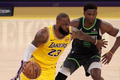LOS ANGELES, CA - APRIL 30: Los Angeles Lakers forward LeBron James (23) looks to get past Minnesota Timberwolves guard Anthony Edwards (5) during game 5 of the first round of the NBA Western Conference Playoffs between the Minnesota Timberwolves and the Los Angeles Lakers on April 30, 2025, at Crypto.com Arena in Los Angeles, CA. (Photo by Jevone Moore/Icon Sportswire via Getty Images)