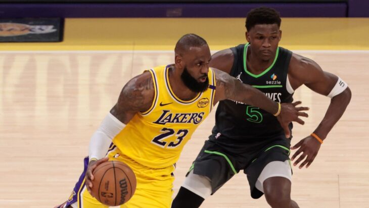 LOS ANGELES, CA - APRIL 30: Los Angeles Lakers forward LeBron James (23) looks to get past Minnesota Timberwolves guard Anthony Edwards (5) during game 5 of the first round of the NBA Western Conference Playoffs between the Minnesota Timberwolves and the Los Angeles Lakers on April 30, 2025, at Crypto.com Arena in Los Angeles, CA. (Photo by Jevone Moore/Icon Sportswire via Getty Images)