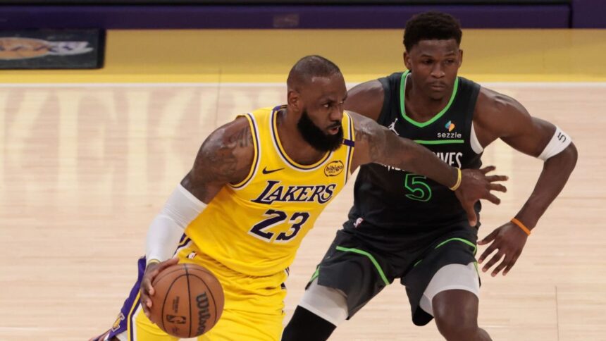LOS ANGELES, CA - APRIL 30: Los Angeles Lakers forward LeBron James (23) looks to get past Minnesota Timberwolves guard Anthony Edwards (5) during game 5 of the first round of the NBA Western Conference Playoffs between the Minnesota Timberwolves and the Los Angeles Lakers on April 30, 2025, at Crypto.com Arena in Los Angeles, CA. (Photo by Jevone Moore/Icon Sportswire via Getty Images)