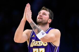 Mar 27, 2026; Los Angeles, California, USA; Los Angeles Lakers guard Luka Doncic (77) gestures during the second half against the Brooklyn Nets at Crypto.com Arena. Mandatory Credit: William Liang-Imagn Images