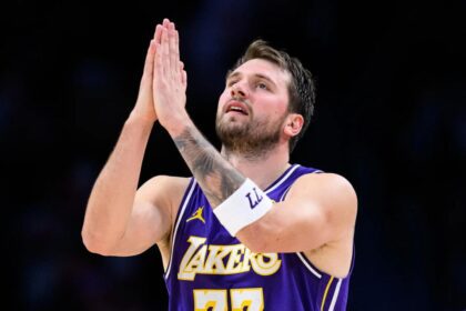 Mar 27, 2026; Los Angeles, California, USA; Los Angeles Lakers guard Luka Doncic (77) gestures during the second half against the Brooklyn Nets at Crypto.com Arena. Mandatory Credit: William Liang-Imagn Images