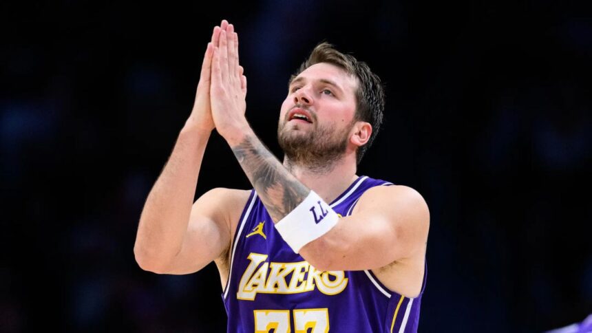 Mar 27, 2026; Los Angeles, California, USA; Los Angeles Lakers guard Luka Doncic (77) gestures during the second half against the Brooklyn Nets at Crypto.com Arena. Mandatory Credit: William Liang-Imagn Images