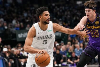DALLAS, TX - DECEMBER 7: Quentin Grimes #5 of the Dallas Mavericks drives to the basket during the game against the Los Angeles Lakers on December 7, 2025 at American Airlines Center in Dallas, Texas. (Photo by Glenn James/NBAE via Getty Images)