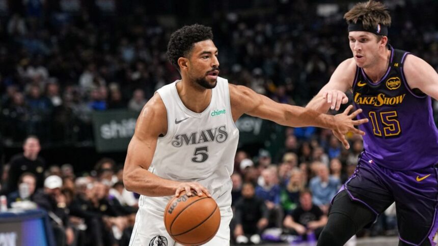 DALLAS, TX - DECEMBER 7: Quentin Grimes #5 of the Dallas Mavericks drives to the basket during the game against the Los Angeles Lakers on December 7, 2025 at American Airlines Center in Dallas, Texas. (Photo by Glenn James/NBAE via Getty Images)