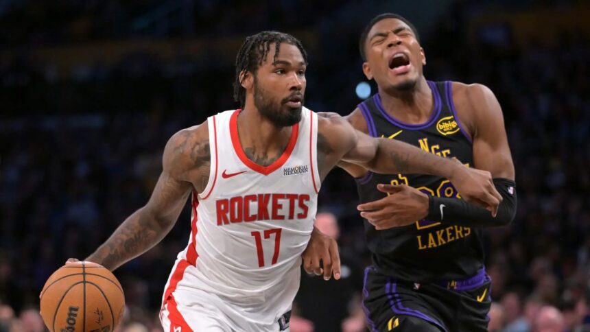 Apr 21, 2026; Los Angeles, California, USA; Houston Rockets forward Tari Eason (17) drives past Los Angeles Lakers forward Rui Hachimura (28) during the second half of game two of the first round of the 2026 NBA Playoffs at Crypto.com Arena. Mandatory Credit: Jayne Kamin-Oncea-Imagn Images