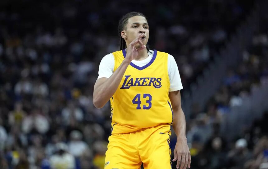 Lakers rookie Cameron Carr celebrates after making a three-pointer against Golden State in an NBA summer league game on Friday night.